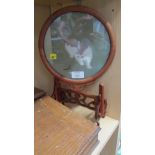 A mid 20th century oriental table screen, having a circular silk panel woven with a cat and cricket,