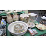 An Edwardian toilet set, comprising jug, basin and chamber pot, together with a jardiniere of