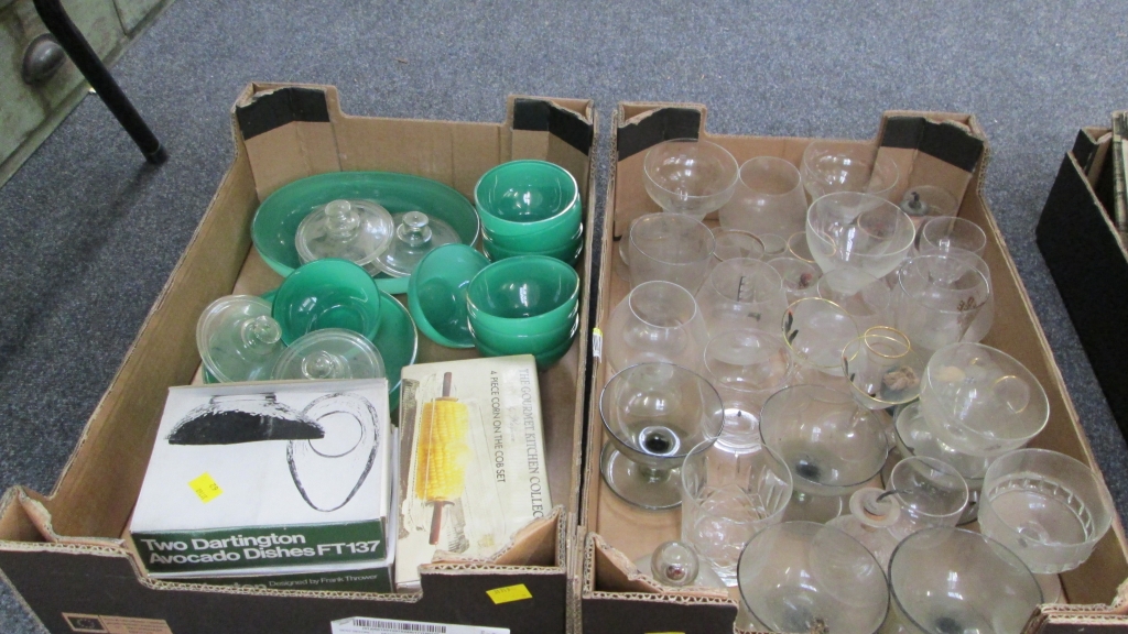 Two boxes of 20th century glass, including green glass covered dishes, corn on the cob sets,