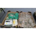 Two boxes of 20th century glass, including green glass covered dishes, corn on the cob sets,