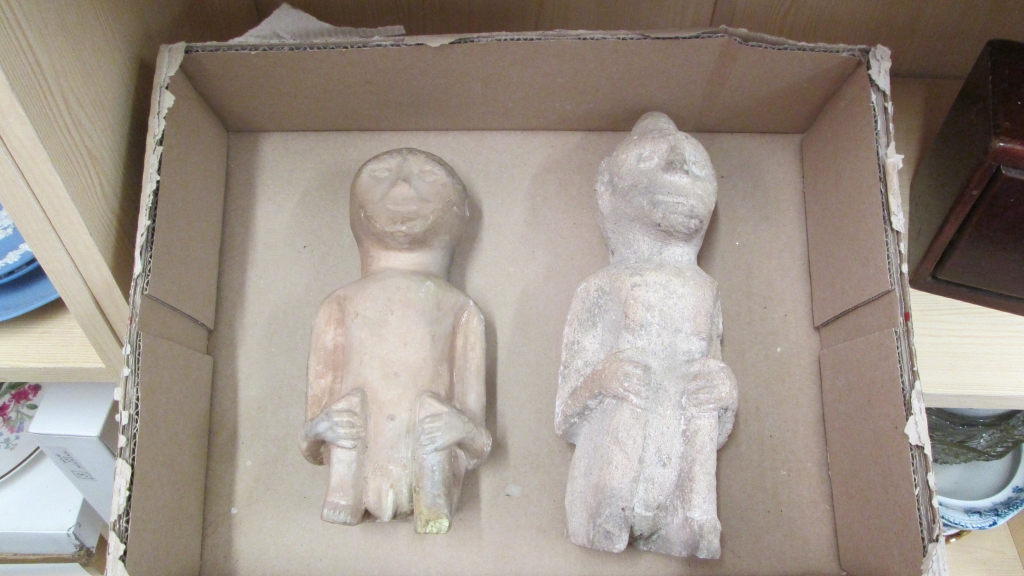 Two carved stone fertility figures