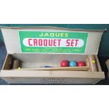 A Jaques croquet set, in original box, (lacking hoops)