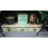 A late Victorian bank of three painted pine drawers, a Victorian copper cauldron, steel cauldron,