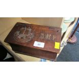 A 1944 carved olive wood military book form box