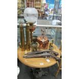 A copper and brass oil lamp, and other wares