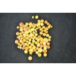 A quantity of amber buttons - approx weight 64g CONDITION REPORT: commensurate with age