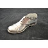 An Edwardian silver novelty pin cushion in the form of a lace-up shoe with wooden sole, Chester