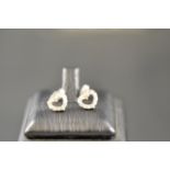 A pair of 18ct gold heart shaped earring
