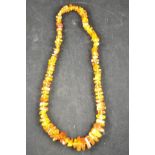 A free form graduated amber bead necklac