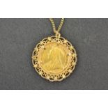 A Victorian 1898 gold sovereign in 9ct gold filigree mount,