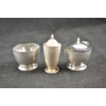 A silver three piece condiment set, engine turned decoration, Birmingham 1922 - approx weight 157g/5