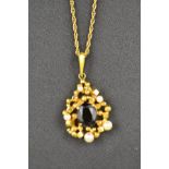 A 9ct gold pendant mounted with garnet and pearls, on a 9ct gold necklace chain - approx. total