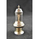 An early George III silver pepper caster, 11cms, London 1762, maker SW (possibly Samuel Wood), top