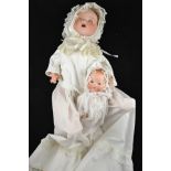 An Armand Marseille Dream Baby 351/5K bisque headed doll, sleepy brown eyes, open mouth with