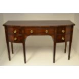 An early 19th century mahogany sideboard, centre drawer with three drawers beside - H92cm, W162cm,