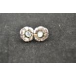 A pair of Georg Jensen silver and moonstone earrings of floral form, marked 925, Denmark, 36 -