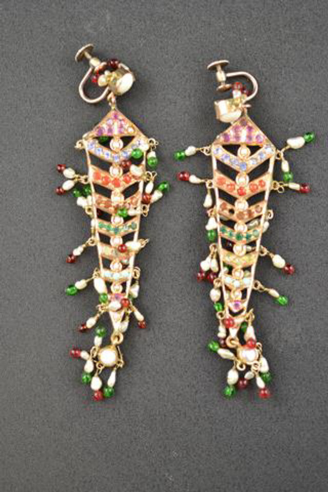 A pair of Indian style yellow metal chandelier type earrings set with pearls and gemstones of