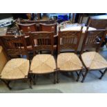 Set of 4 Oak Arts 7 Crafts carved dining chairs with rush seats