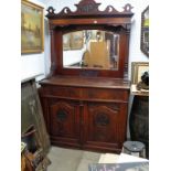 19thC Mahogany dresser with mirror back, carved pediment and bow fronted base with panel doors