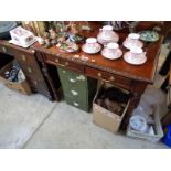 20thC Mahogany desk of 2 drawers with brass drop handles and carved ornate legs