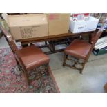 Oak plank topped refectory table with a set of 6 Oak barley twist dining chairs with Faux leather