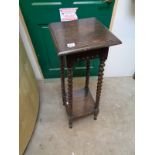 Oak 1920s Jardinière stand with Barley twist supports and under tier