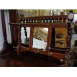 Edwardian Mahogany Turned wall mounted coat rack with brass fittings