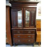 19thC Mahogany linen press with mirrored doors and 2 over 2 drawer base on bun feet