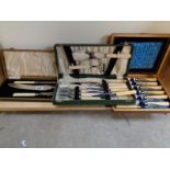 Edwardian Wooden cased Carving set and 2 cased fish knife and fork sets
