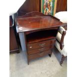 Mahogany Music cabinet with coppered drop handles below gallery top