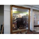 Large Ornate Gilt framed bevel edged mirror