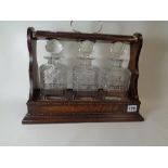 Oak 1920s 3 Decanter Tantalus with Silver plated mounts