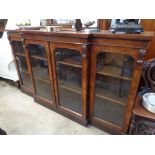 19thC Breakfront Walnut bookcase with acanthus applied detail and glazed panel doors