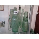 Collection of assorted vintage glassware bottles inc. Wadsworths etc.
