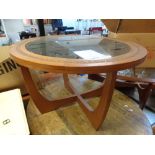 Hardwood Indonesian circular glass topped coffee table