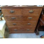 Edwardian Pitch Pine chest of 2 over 3 drawers with brass drop handles