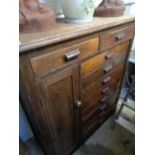 Oak Edwardian Haberdashery cabinet with metal cup handles