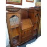 Oak 1920s bureau fall front leaded glazed bookcase with carved detail