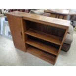 Art Deco shaped bookcase with single cupboard