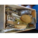 Tray of 19thC and later flatware, moulds and 3 dressing table brushes with embossed decoration