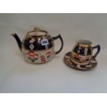 Ornate Sadler Gilded teapot, creamer and stand