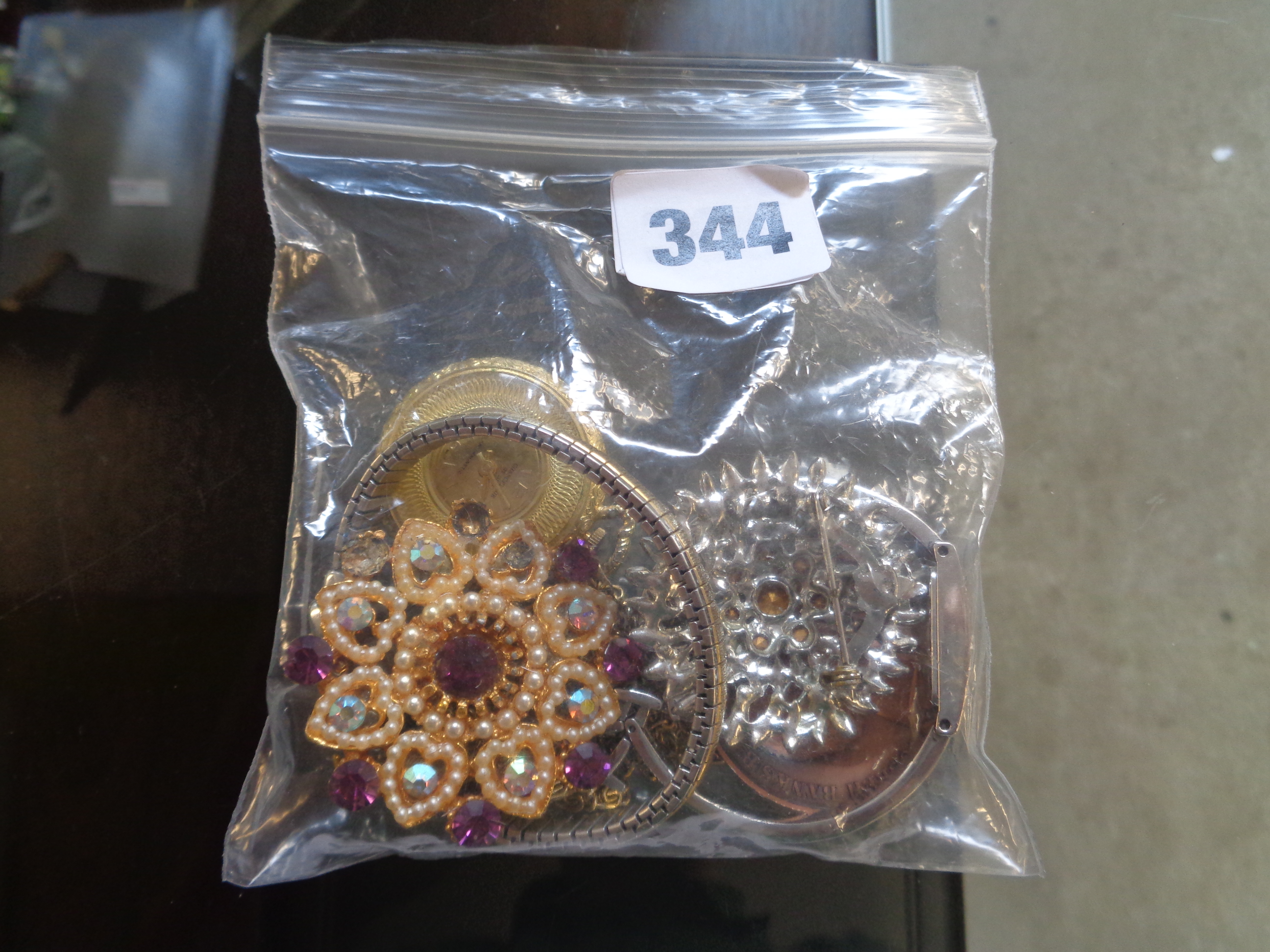 Bag of assorted Costume Jewellery inc. Brooches, Watch, pocket watch etc.