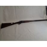 19thC Army & Navy C.S.L. two barrel shotgun with chaised decoration to barrels and Walnut stock