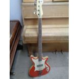 Bass Guitar with red and cream decoration and applied cream detail