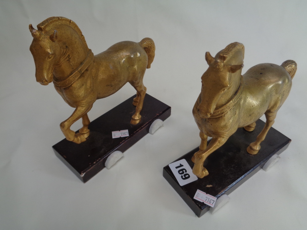 Pr. Of Heavy Brass Desk Horse figures mounted on wooden bases