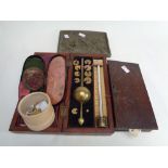 T S Winter & Sons of Newcastle Bone cased measure set, 2 cased balance sets and a plaque depicting