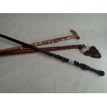 African Carved Hardwood walking stick and 2 other sticks