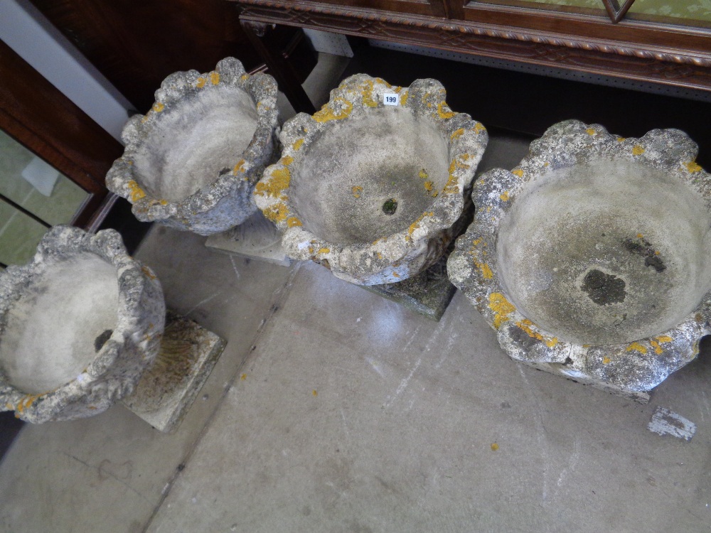 Set of 4 20thC Concrete Garden Acanthus flower urns on Square foliate bases