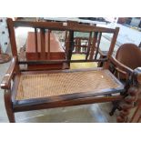 Edwardian Mahogany caned seat with carved stick back