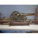 Heavy Brass model of a canon and a Wooden two ended carving set